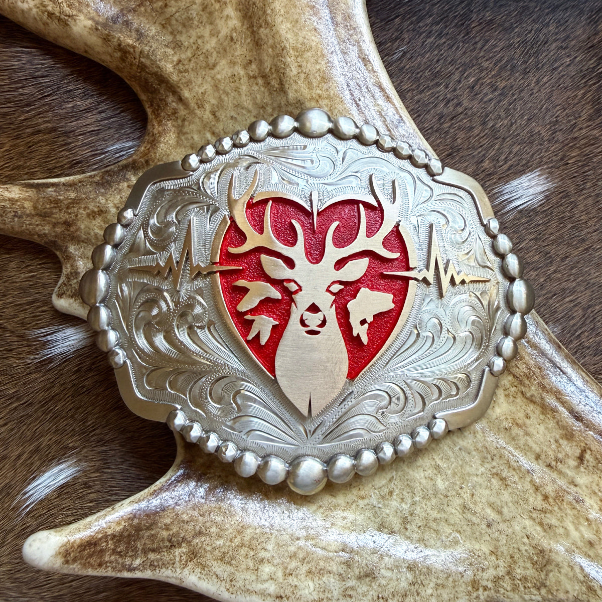 Heartbeat of a Hunter Elipse Red Heart Belt Buckle