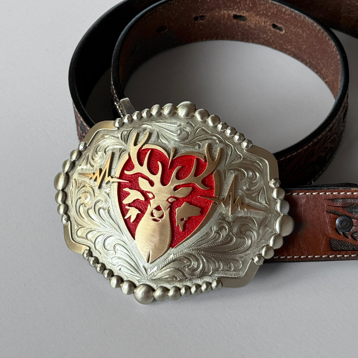 Heartbeat of a Hunter Elipse Red Heart Belt Buckle